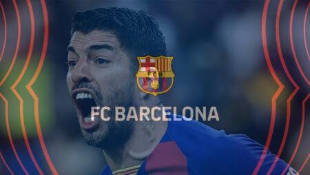 Barcelona keep the title race alive after Luis Suarez sends Espanyol down hitting a landmark